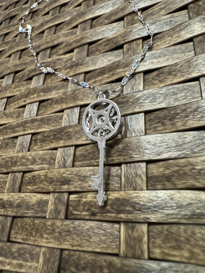 Silver Spinning Key-Shape (Type #2) Necklace with Cubic Zirconia – Anxiety Relief Jewelry